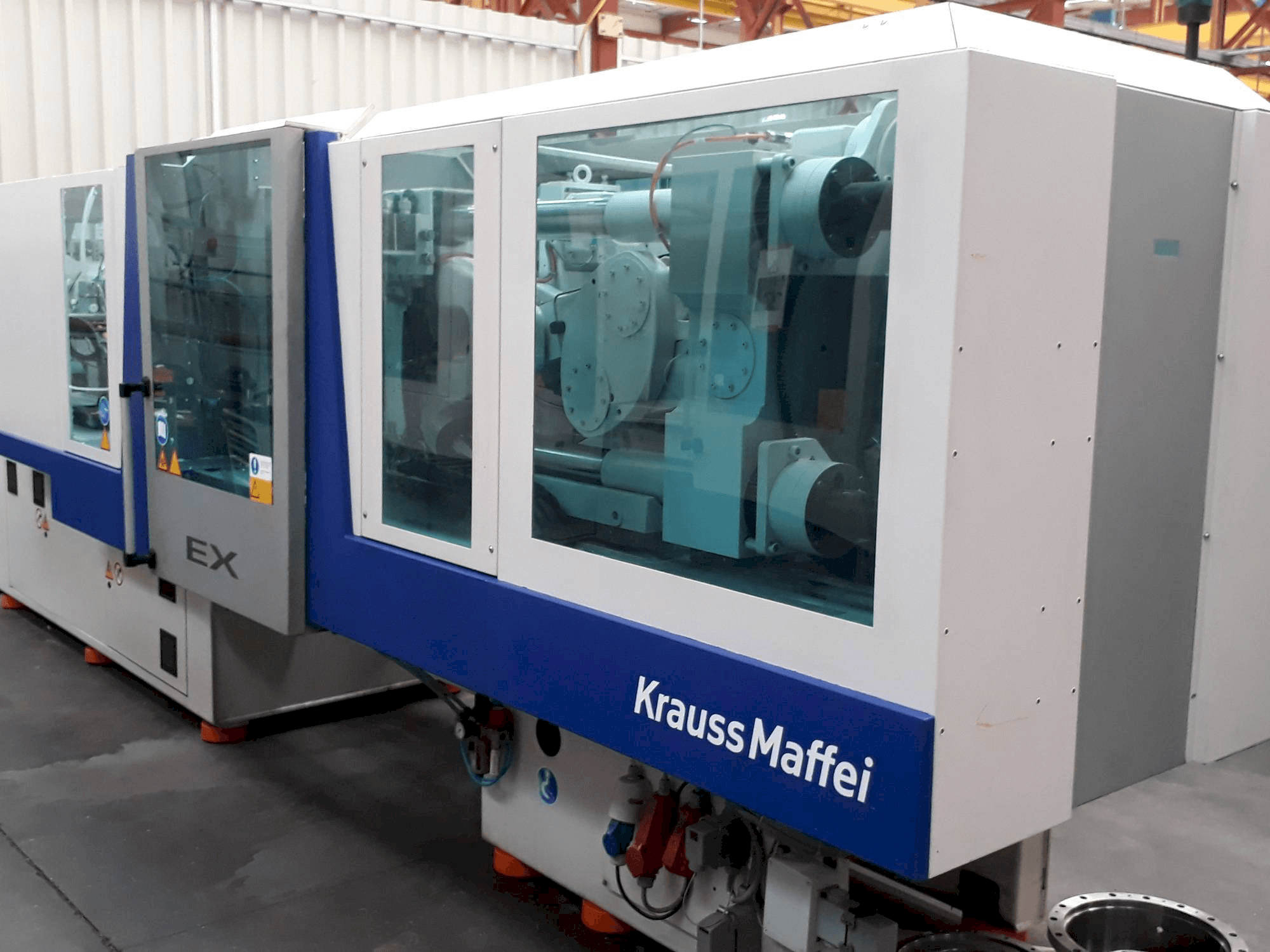 Mašīnas Krauss Maffei 160-750 EX pretskats