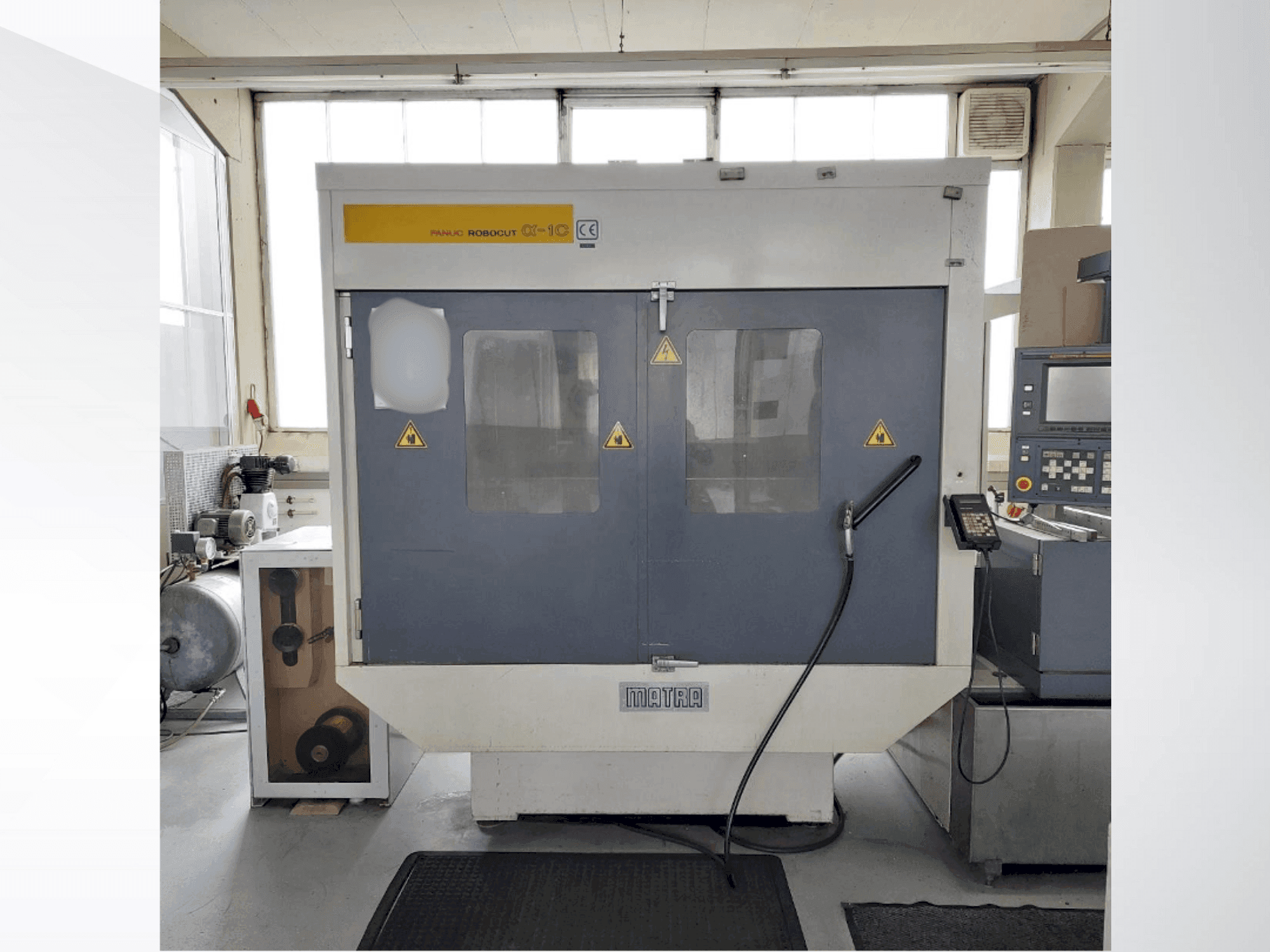 Mašīnas FANUC Robocut Alpha 1C pretskats