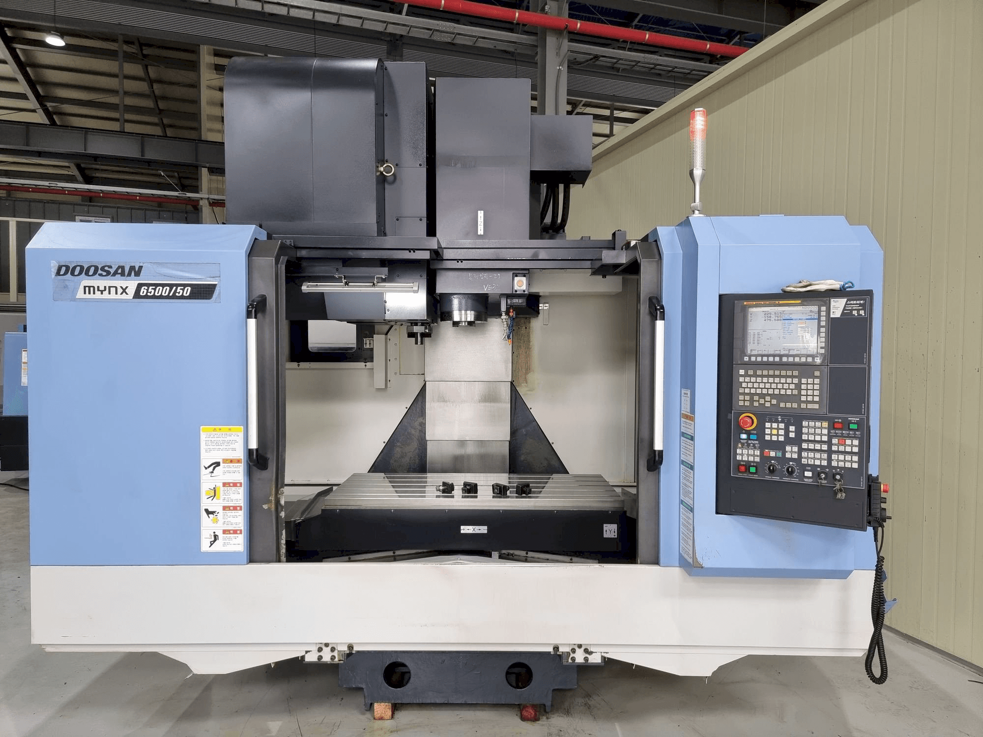 Mašīnas Doosan MYNX 6500/50 pretskats