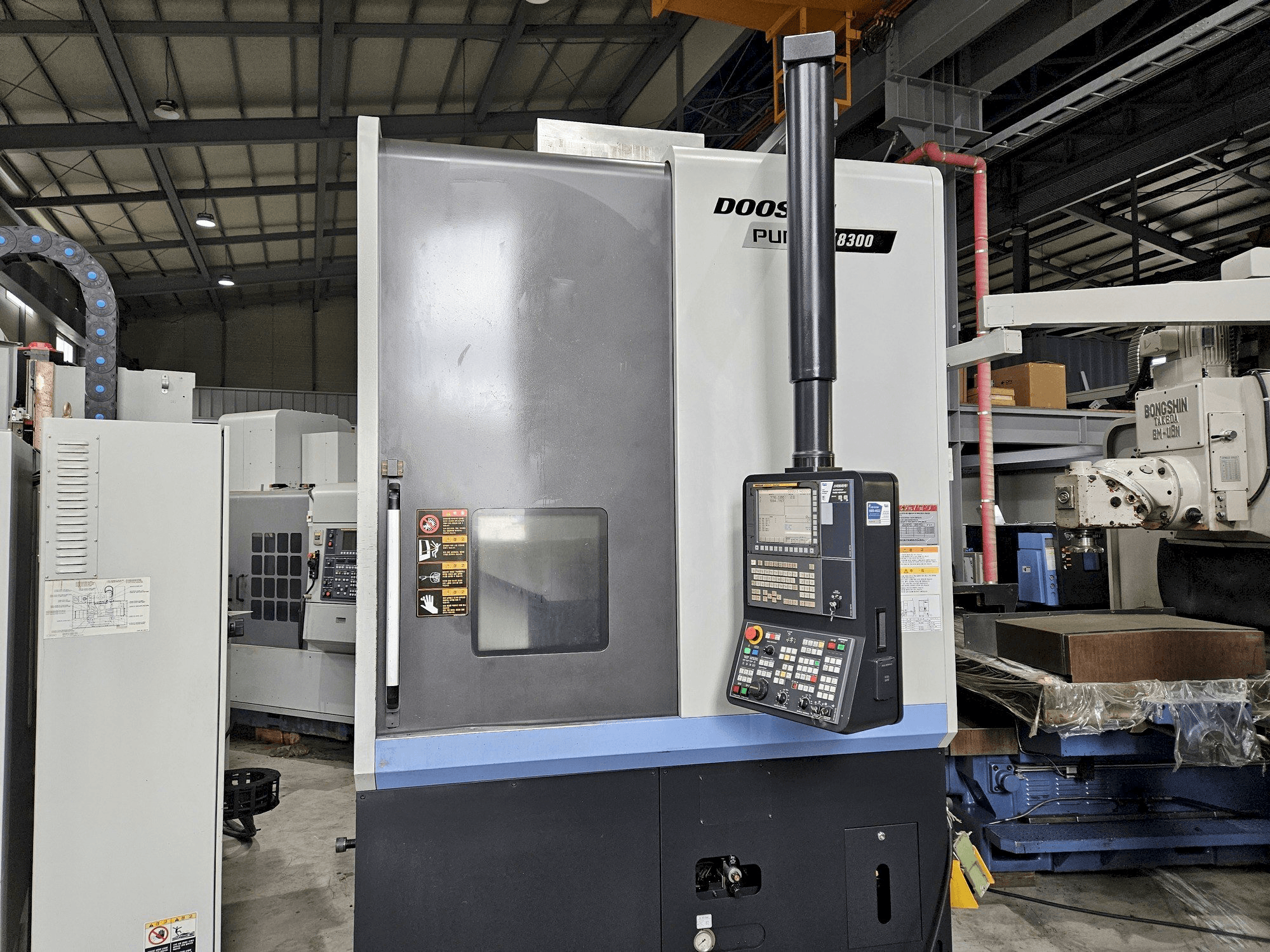 Mašīnas DOOSAN PUMA V8300 pretskats