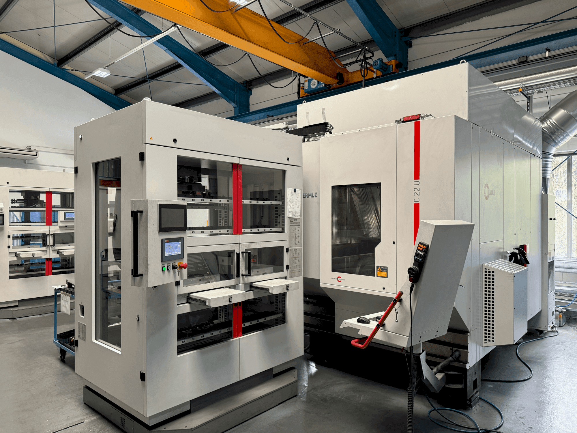 Mašīnas HERMLE C22 with handling system IH30 (2017) pretskats