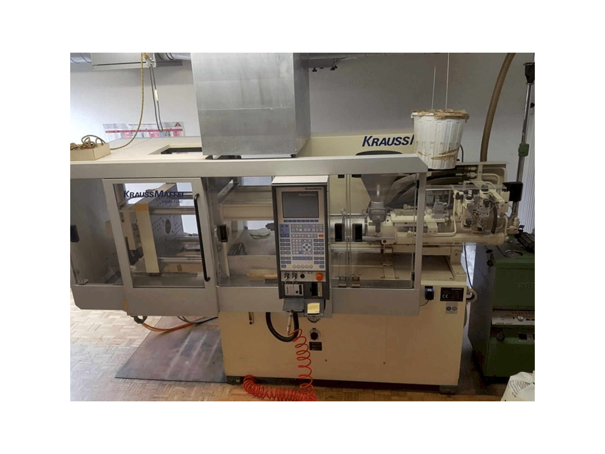 Mašīnas Krauss Maffei 40-125 C Winner pretskats
