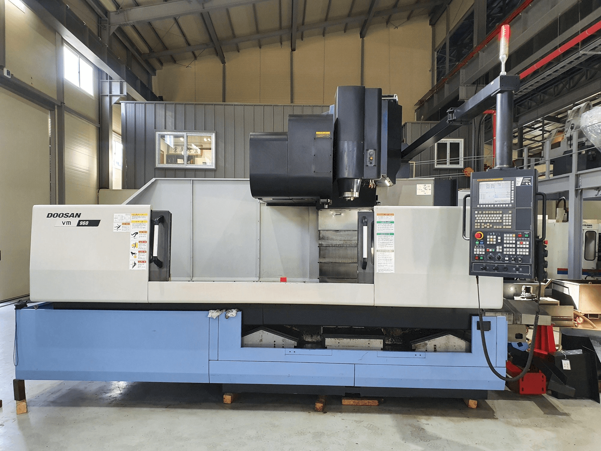 Mašīnas Doosan VM 960 pretskats