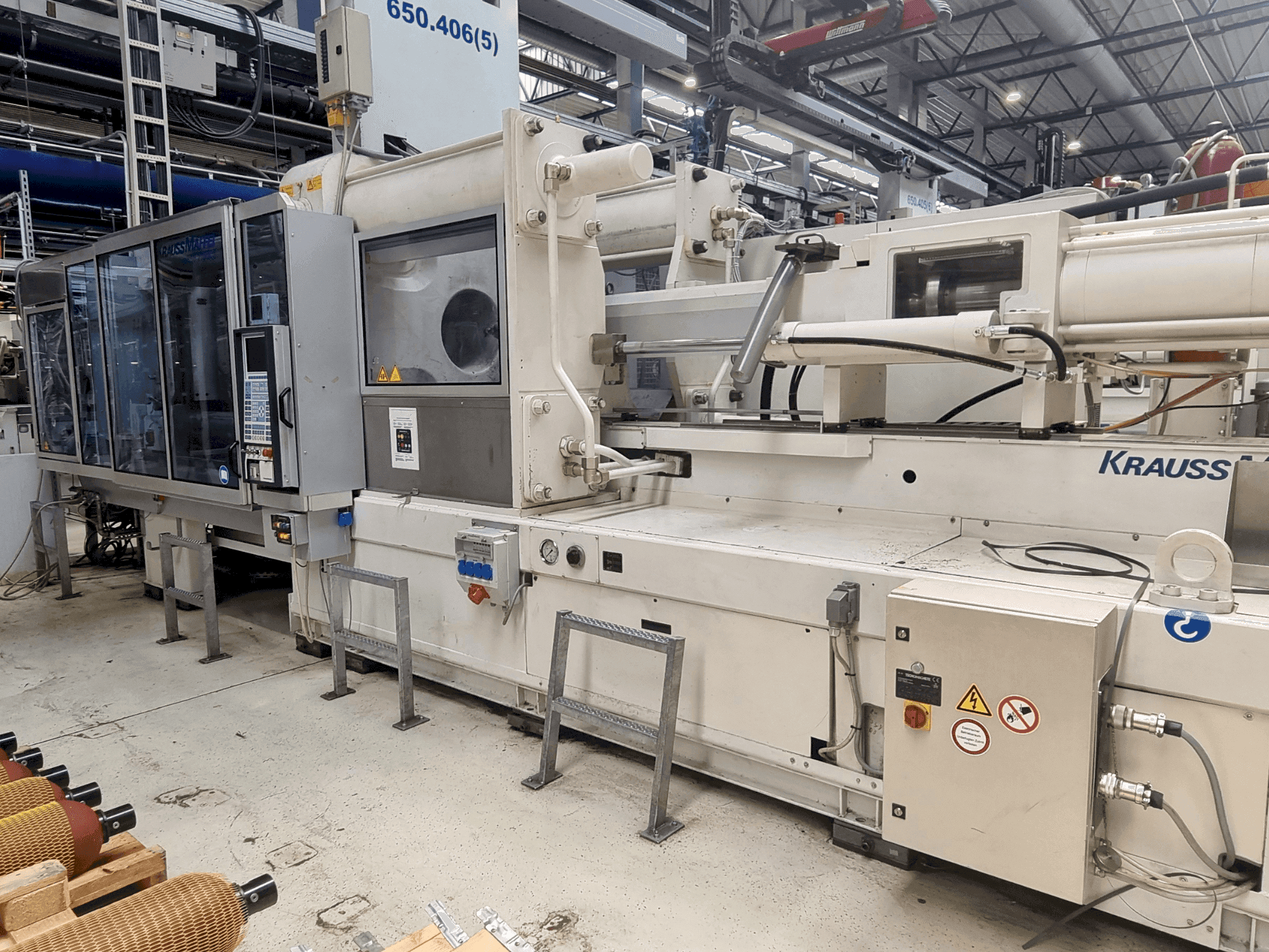 Mašīnas Krauss Maffei 650-2700 C2 pretskats